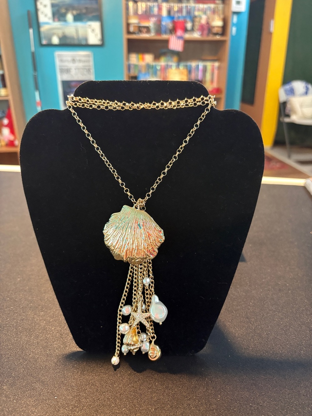 Coach Gold-Tone Iridescent Shell Pendant Necklace with Dangles